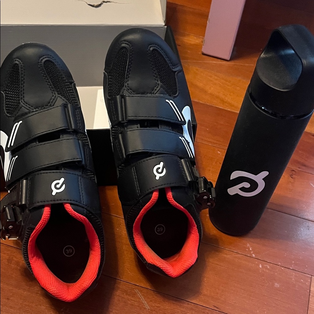 Peloton cycling shoes and water bottle